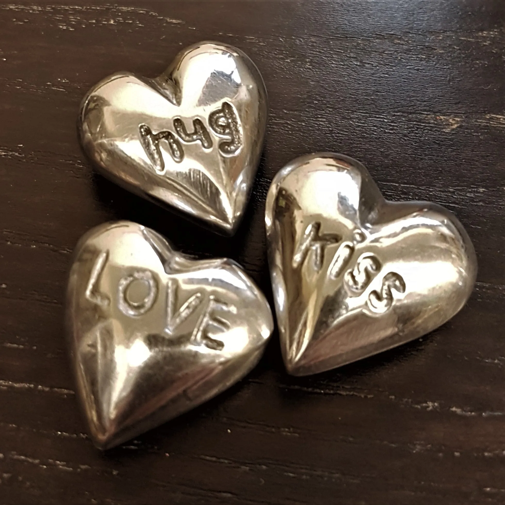 Metal Heart-Shaped Trinket Box with Love-Themed 'Pebbles'