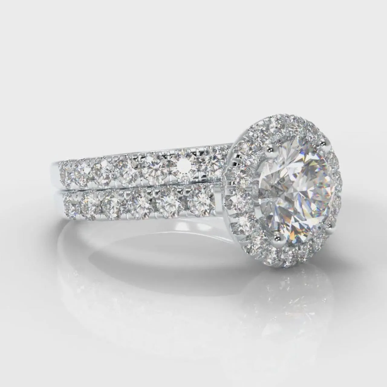 Micropavé Round Brilliant Cut Diamond Halo Bridal Set