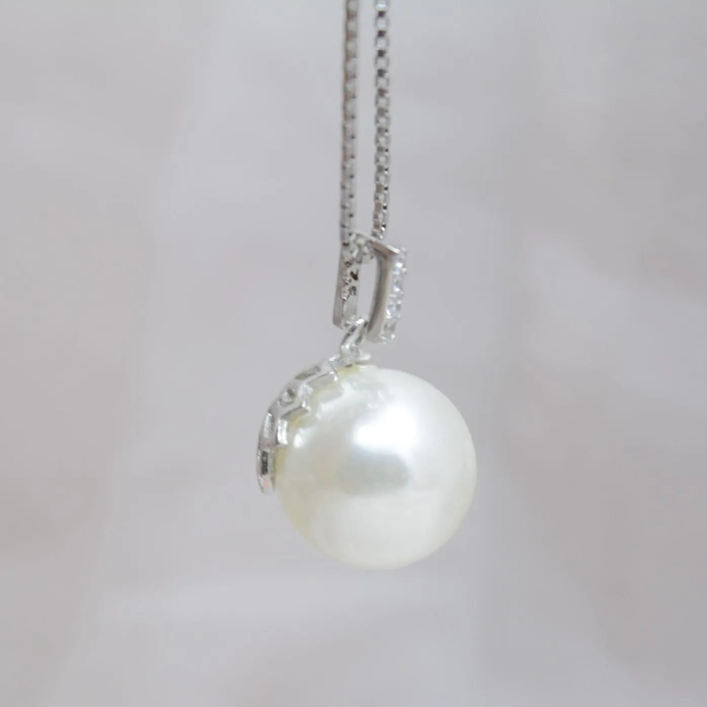 Pure Radiance: Silver Pearl Pendant Set